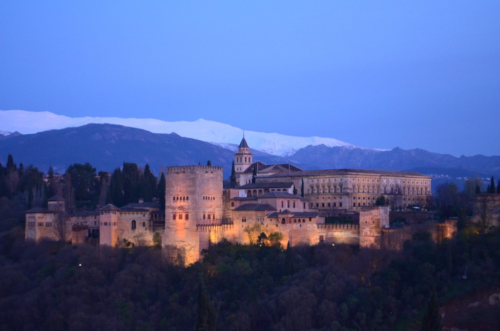 Great view of the Alhambra at sunset. The Sierra Nevada mountain range is in the backdrop